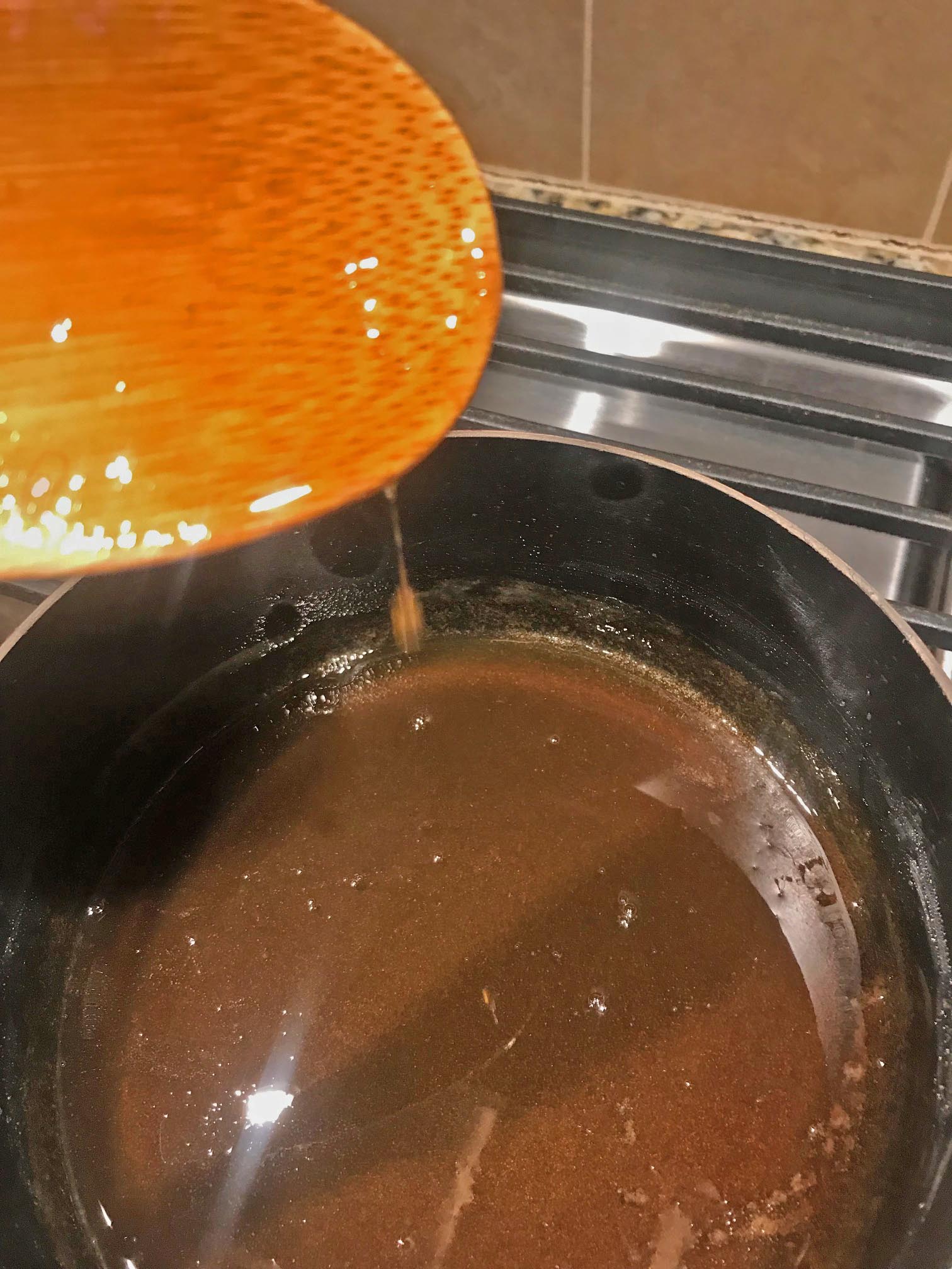 Honey caviar mixture in the saucepan